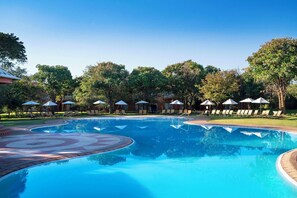 Outdoor pool, pool umbrellas, pool loungers