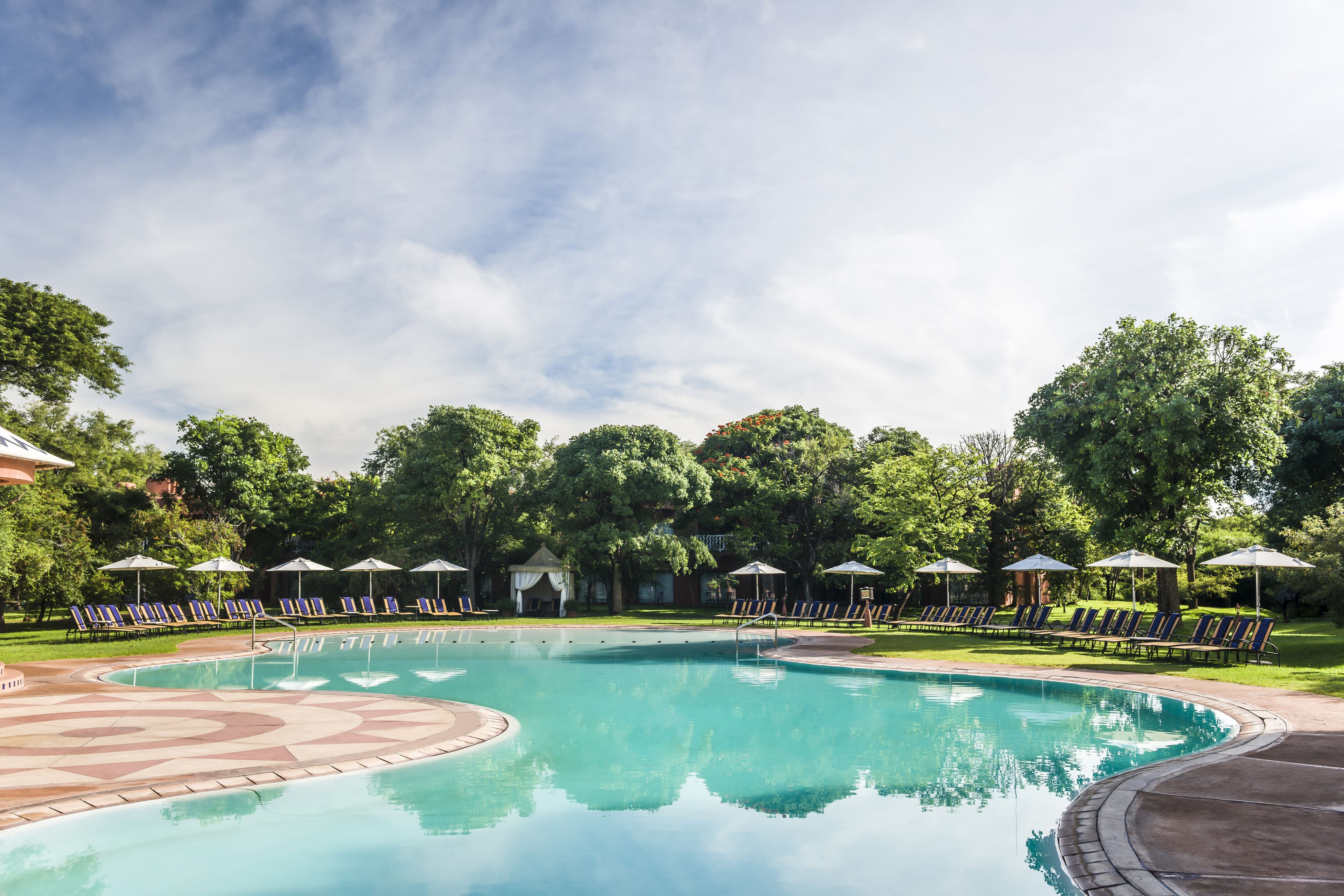 Outdoor pool, pool umbrellas, sun loungers