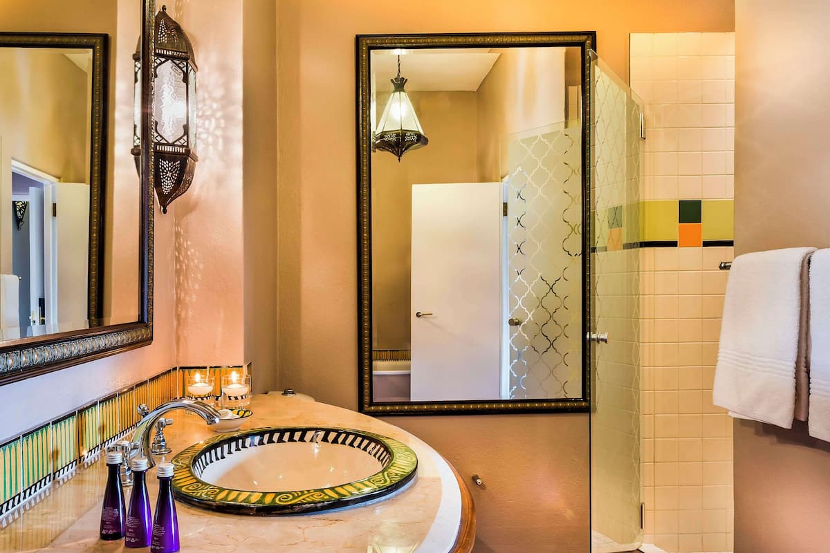 separate bathtub and shower, free toiletries, hair dryer, slippers