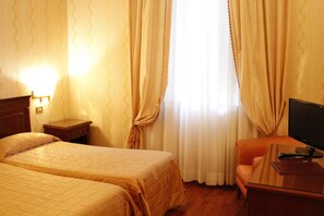 Quadruple Room | Minibar, in-room safe, desk, free WiFi
