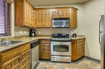 Microwave, coffee/tea maker, cookware/dishes/utensils, dining tables at Hilton Vacation Club Sedona Summit