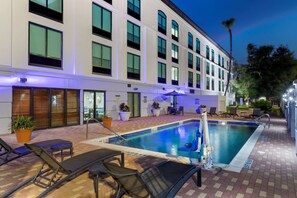 Seasonal outdoor pool, open 10:00 AM to 10:00 PM, sun loungers