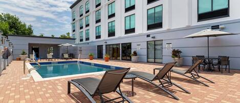 Seasonal outdoor pool, open 10:00 AM to 10:00 PM, sun loungers