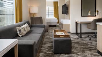 Suite, 1 King Bed, Corner Suite, Trundle Sofa | Desk, laptop workspace, blackout drapes, iron/ironing board