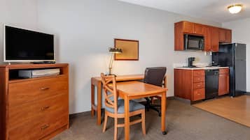 Hypo-allergenic bedding, desk, laptop workspace, blackout curtains