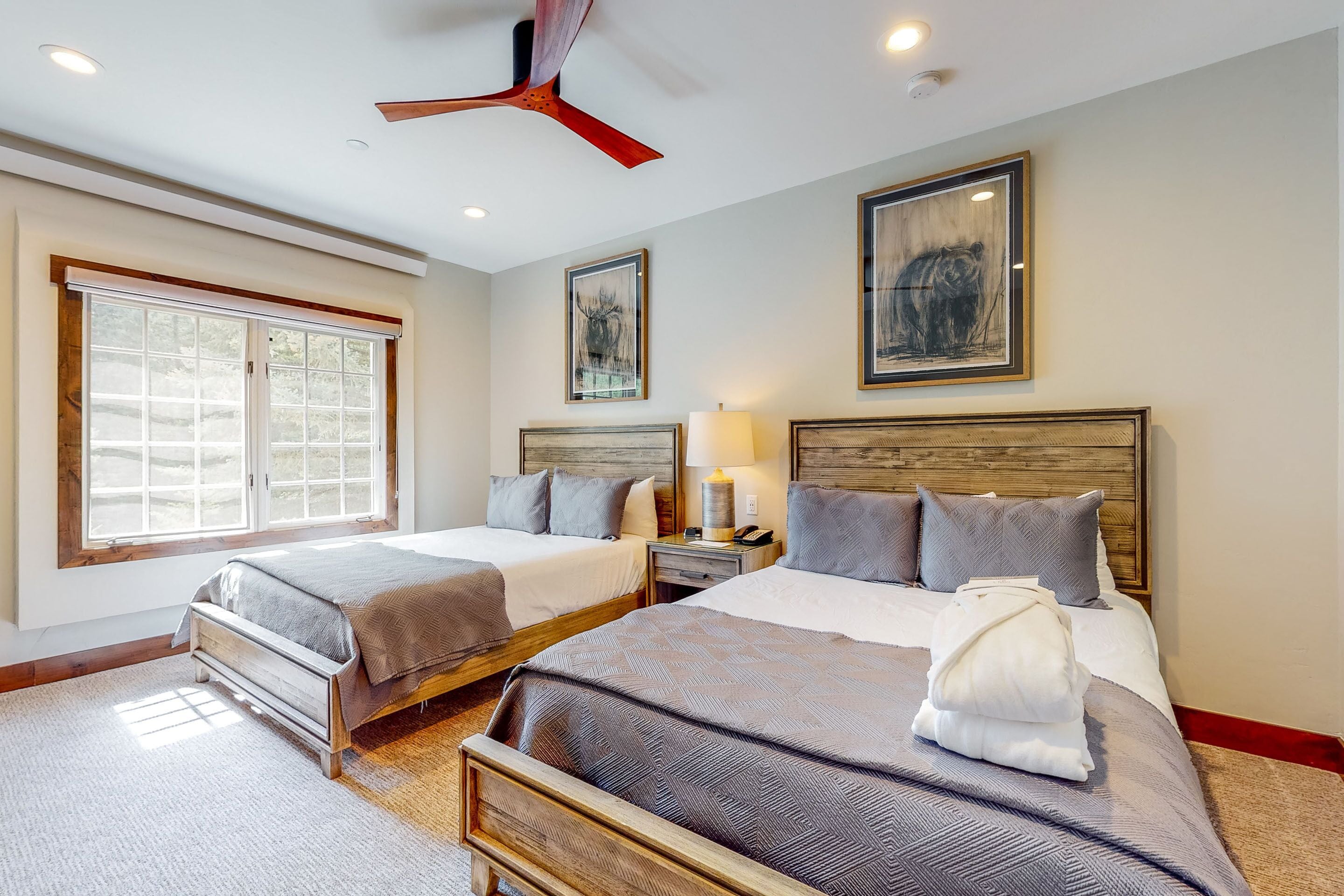 standard 2 bedroom 3 bed condo | premium bedding, in-room safe, individually decorated