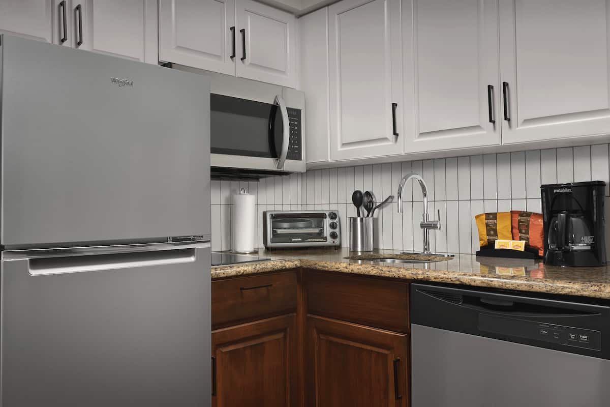 suite, 2 bedrooms | private kitchen | full-sized fridge, microwave, stovetop, dishwasher