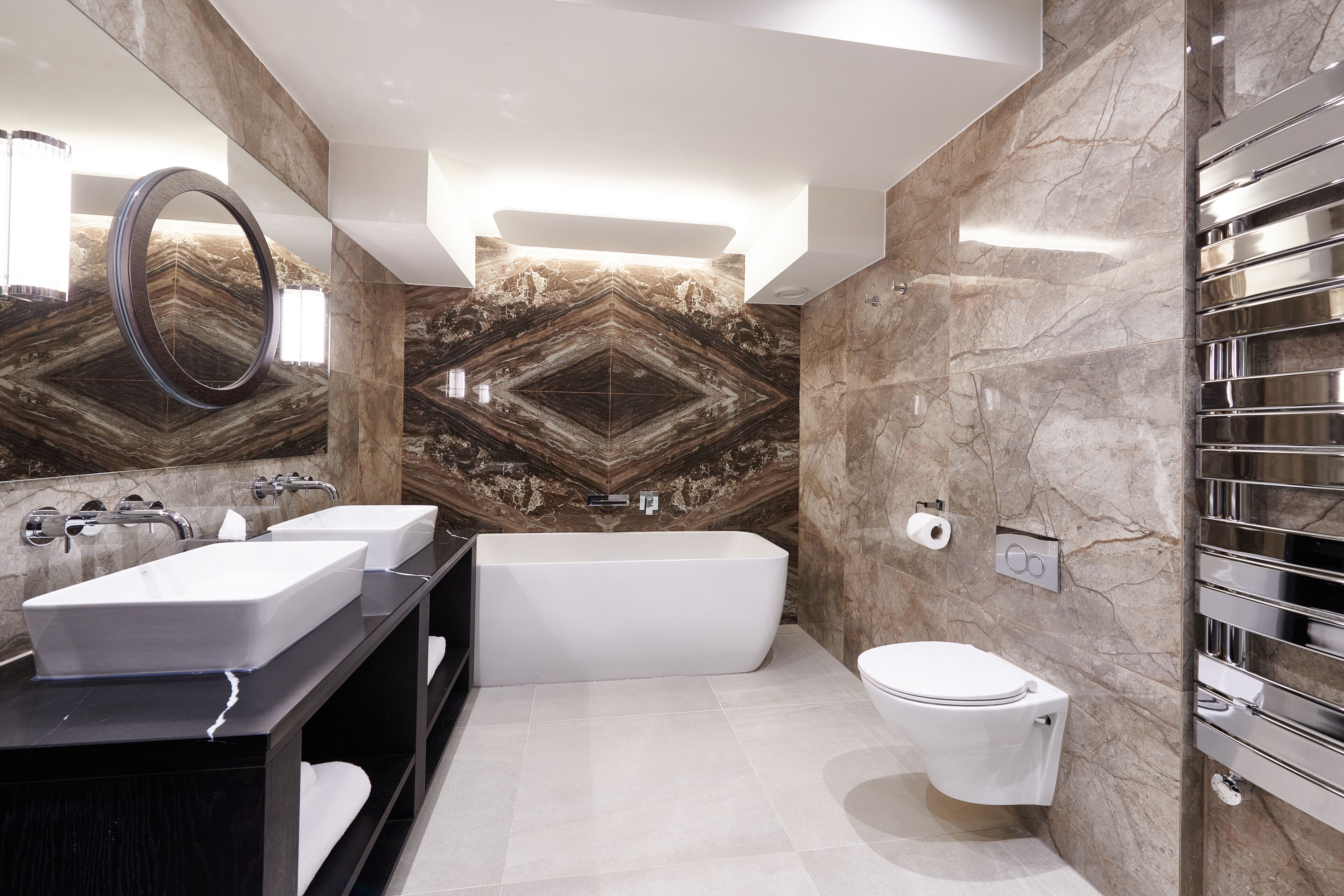 junior suite, 1 king bed, garden view | bathroom | shower, rainfall showerhead, designer toiletries, hair dryer