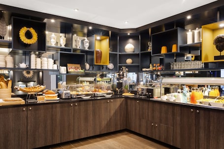 Daily buffet breakfast (EUR 18 per person)