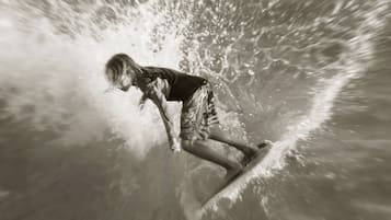 A person surfing a wave.