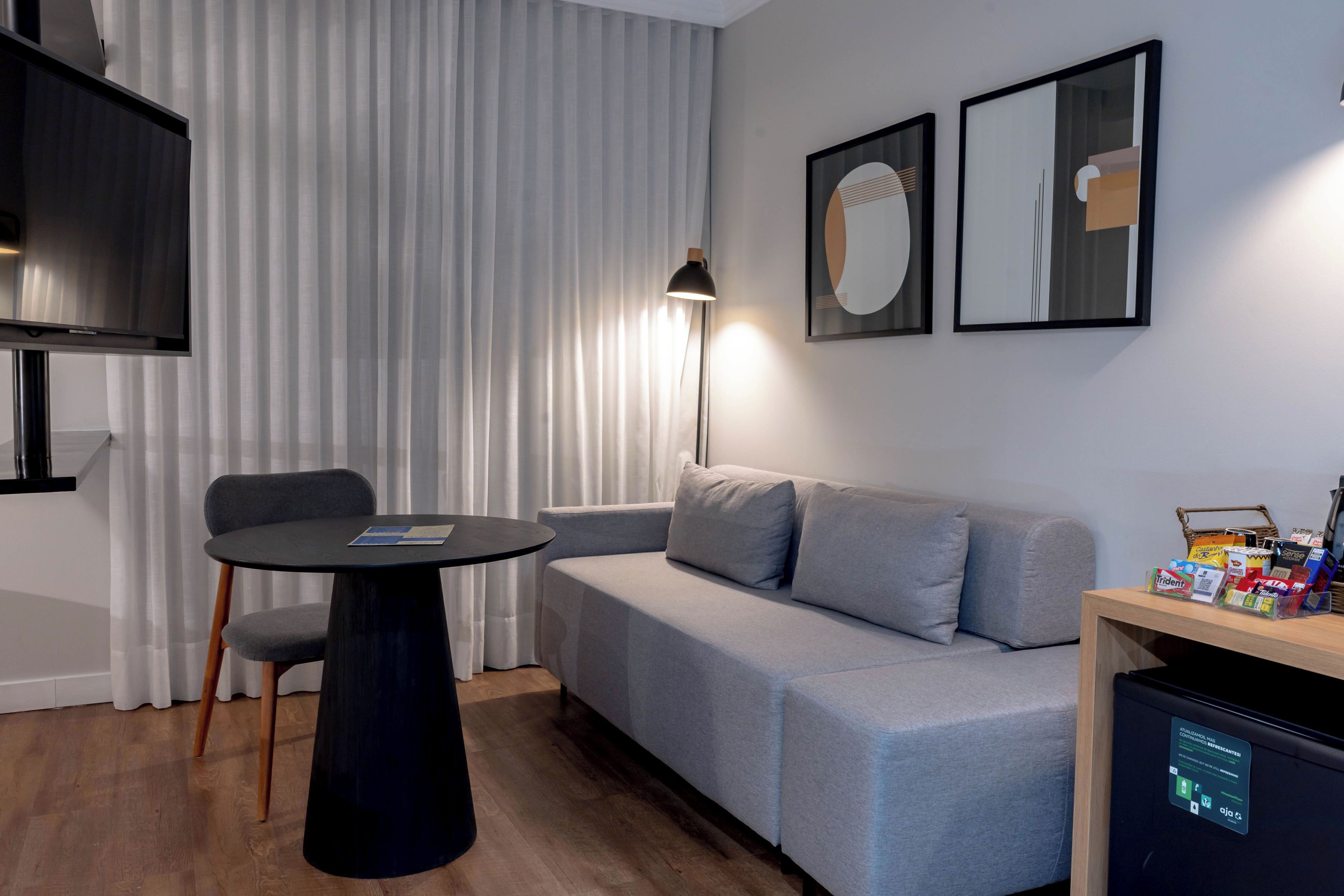 luxury suite, 1 king bed with sofa bed | living area | 32-inch lcd tv with cable channels, tv