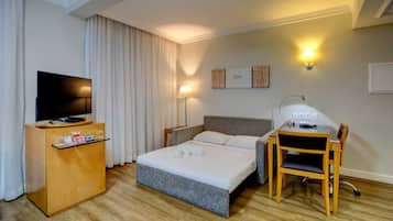 Suite ejecutiva, 1 cama de matrimonio grande con sofá cama | Camas supletorias