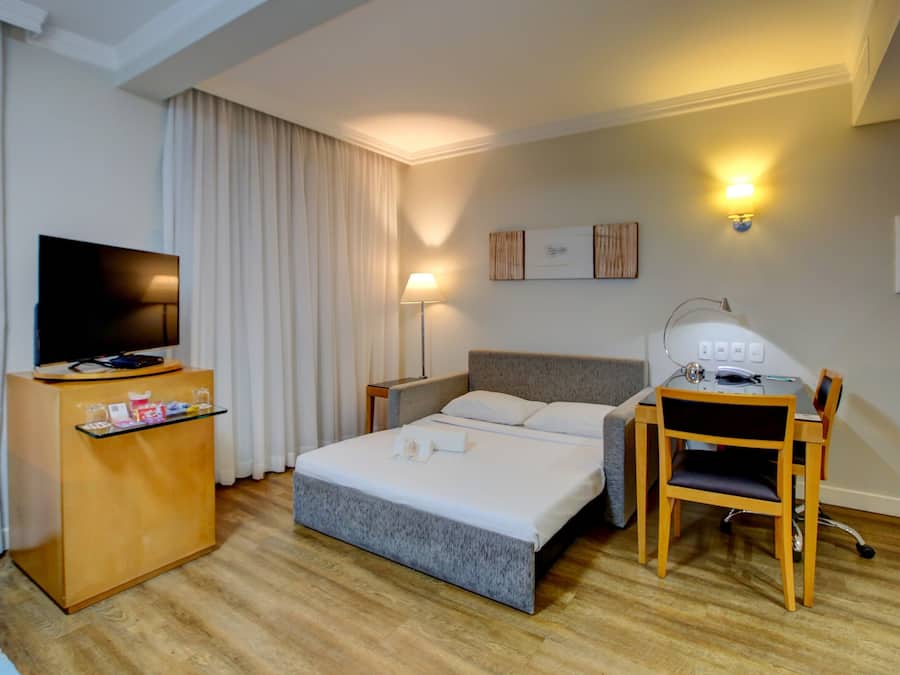Suite ejecutiva, 1 cama de matrimonio grande con sofá cama | Camas supletorias