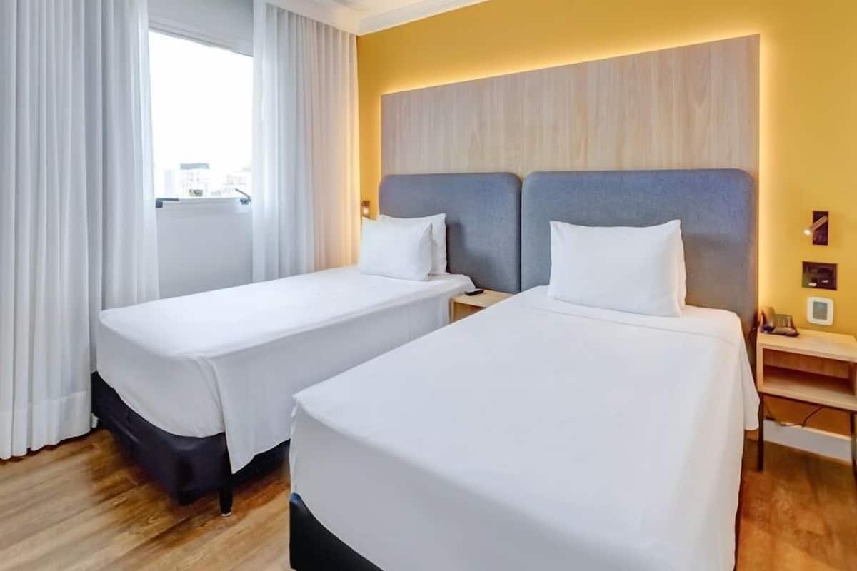 Superior Twin Room, Non Smoking | Minibar, in-room safe, desk, laptop workspace