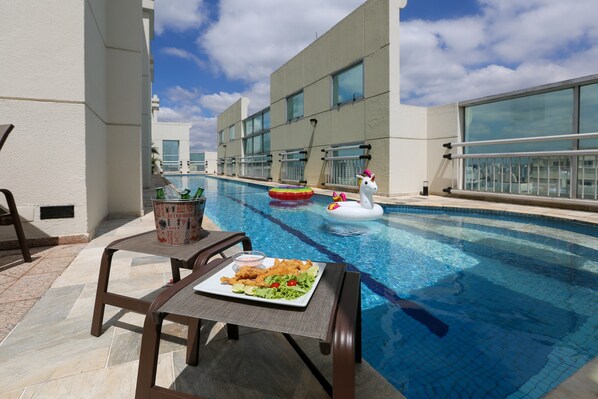 Outdoor pool, sun loungers