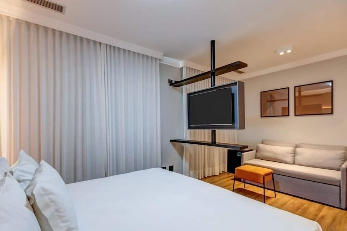 Family Suite, 1 King Bed with Sofa bed | Minibar, in-room safe, desk, laptop workspace