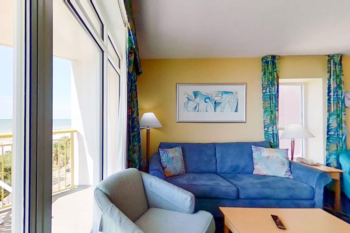 Condo, 2 Bedrooms (Oceanfront) | Living area | Flat-screen TV, DVD player