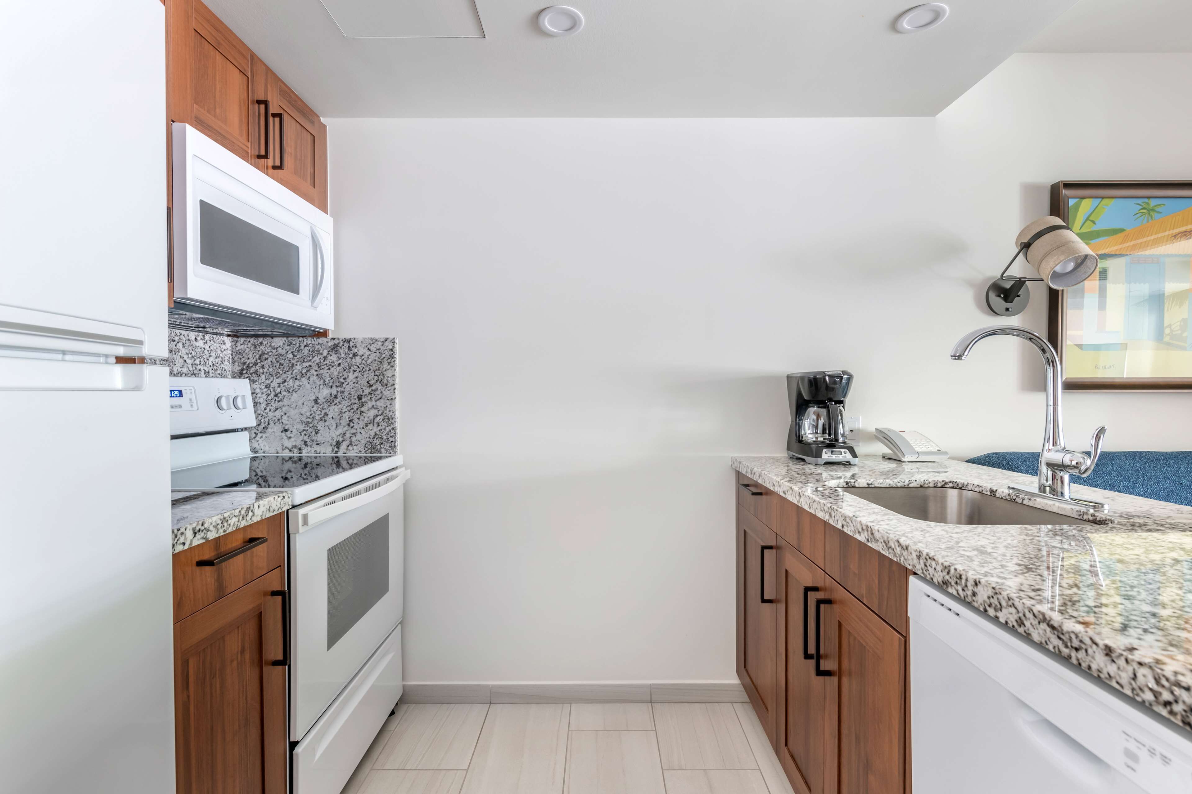 full-sized fridge, microwave, oven, stovetop