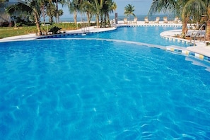 Outdoor pool, pool umbrellas, sun loungers