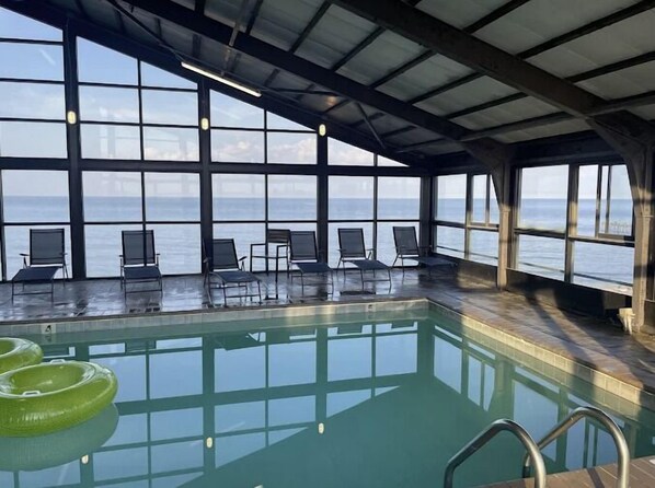 Indoor pool, open 10:00 AM to 8:00 PM, pool loungers