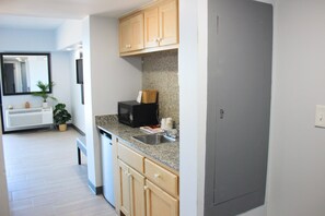 Fridge, microwave, coffee/tea maker, dining tables