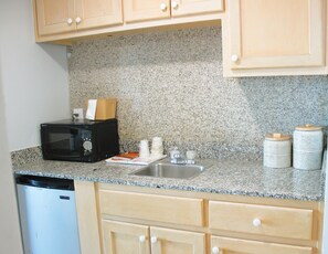 Fridge, microwave, coffee/tea maker, dining tables
