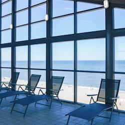 Indoor pool, open 10:00 AM to 8:00 PM, pool loungers