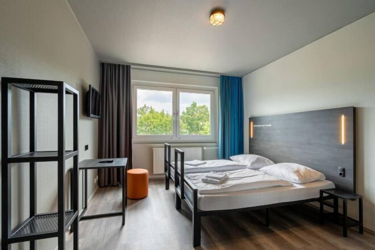 Desk, blackout drapes, WiFi (free), bed sheets