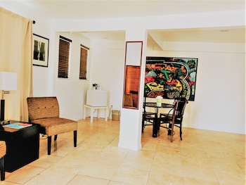 Premium Studio Suite, 2 Queen Beds | In-room safe, desk, laptop workspace, iron/ironing board at Beach Park Hotel