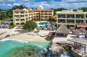 Junior Suite, Beach View | Minibar, in-room safe, iron/ironing board, free WiFi