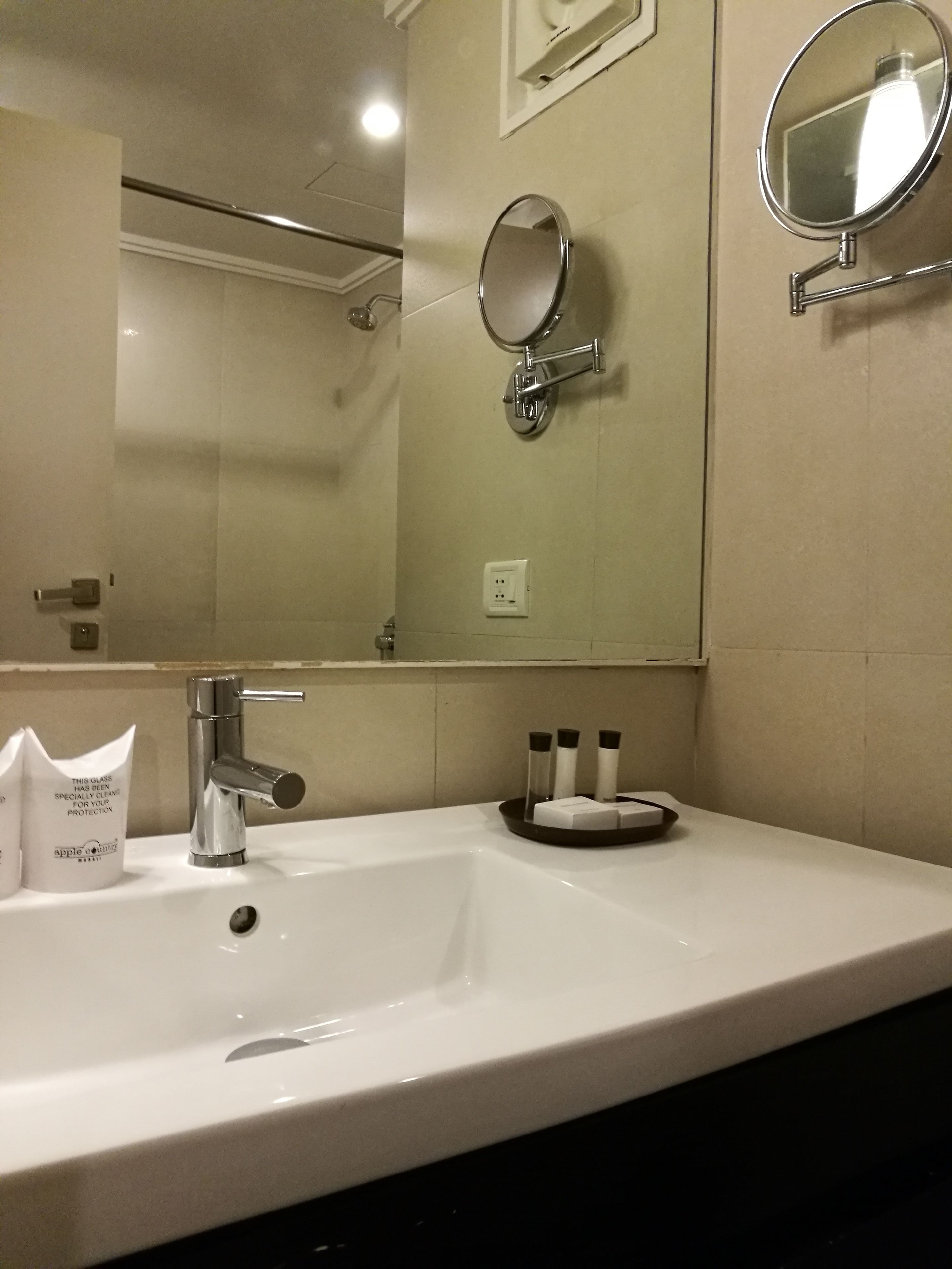 designer toiletries, hair dryer, bathrobes, towels