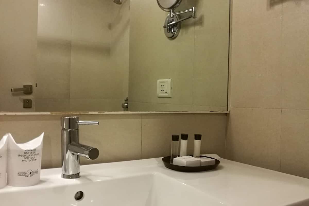 designer toiletries, hair dryer, bathrobes, towels