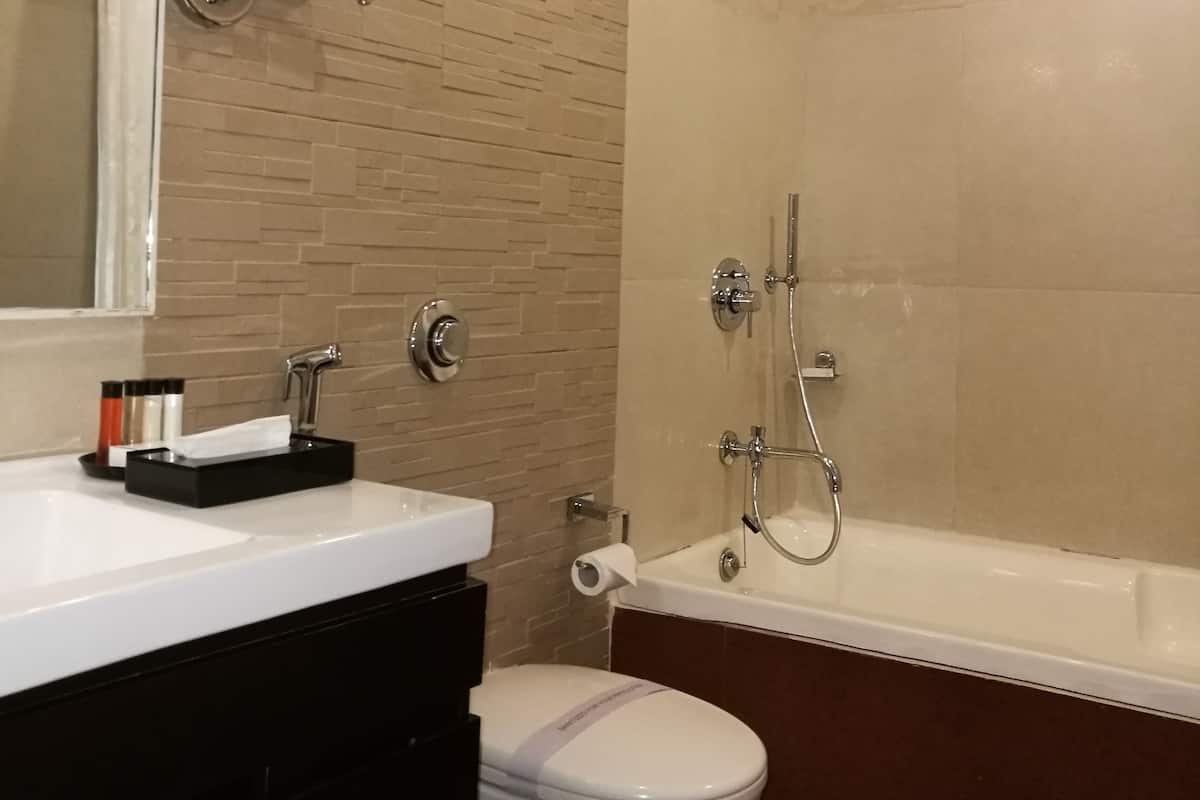 designer toiletries, hair dryer, bathrobes, towels