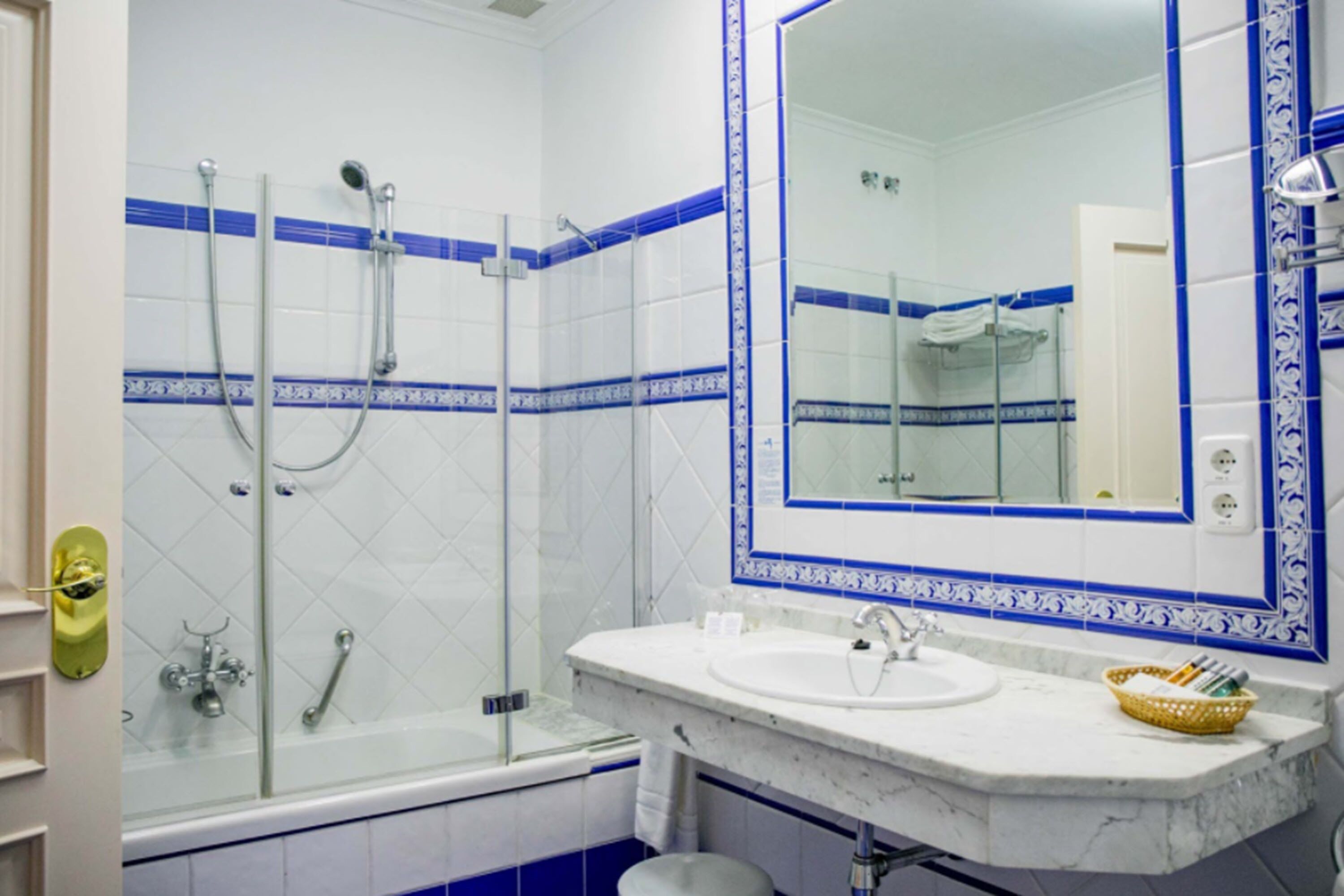 bathtub, hair dryer, bidet, towels