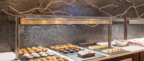 Daily buffet breakfast (EUR 18 per person)