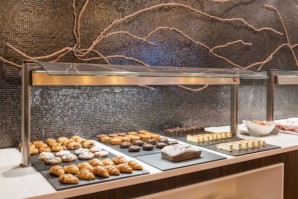 Daily buffet breakfast (EUR 18 per person)