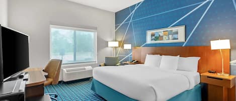 Biancheria da letto ipoallergenica, una scrivania, postazione laptop