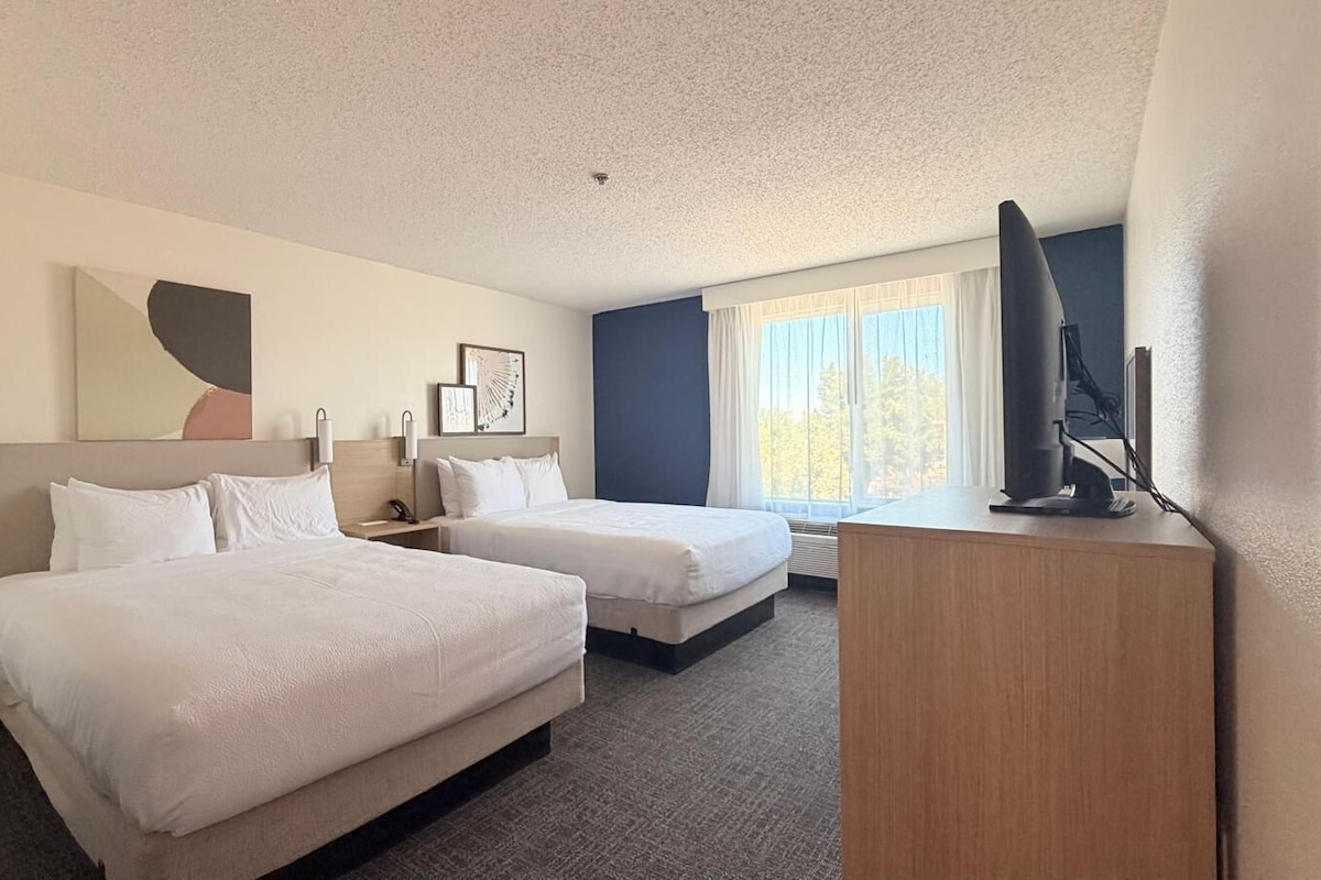 Room, 2 Queen Beds | Premium bedding, desk, iron/ironing board, free cots/infant beds