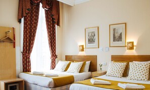 Coffres-forts dans les chambres, fer et planche à repasser