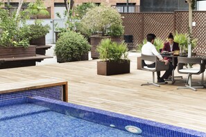 Outdoor pool, sun loungers