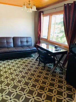 Deluxe Room, 2 Queen Beds, City View | Living room | Flat-screen TV