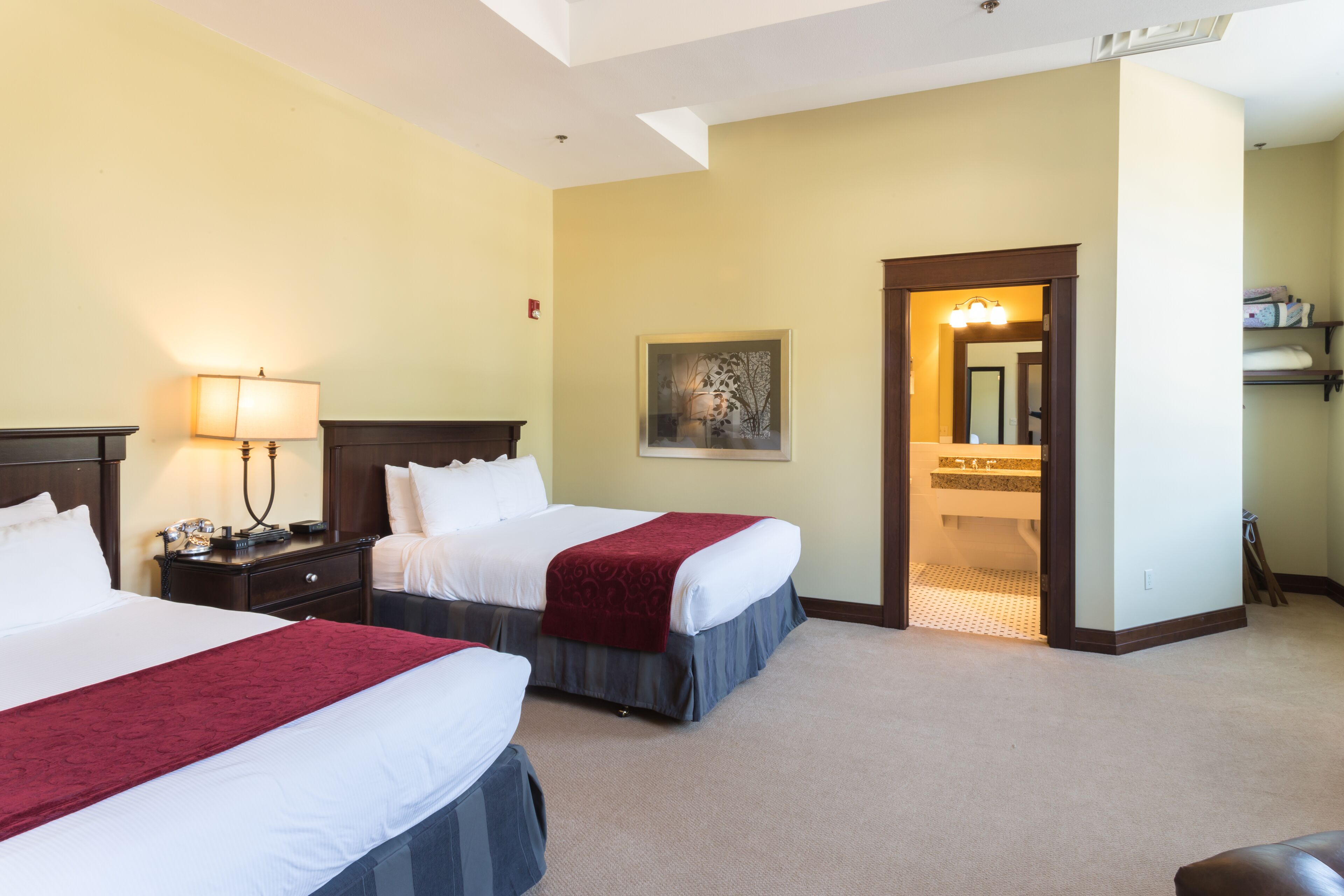 deluxe suite, 2 queen beds (winneshiek suite) | iron/ironing board, free wifi, bed sheets, alarm clocks