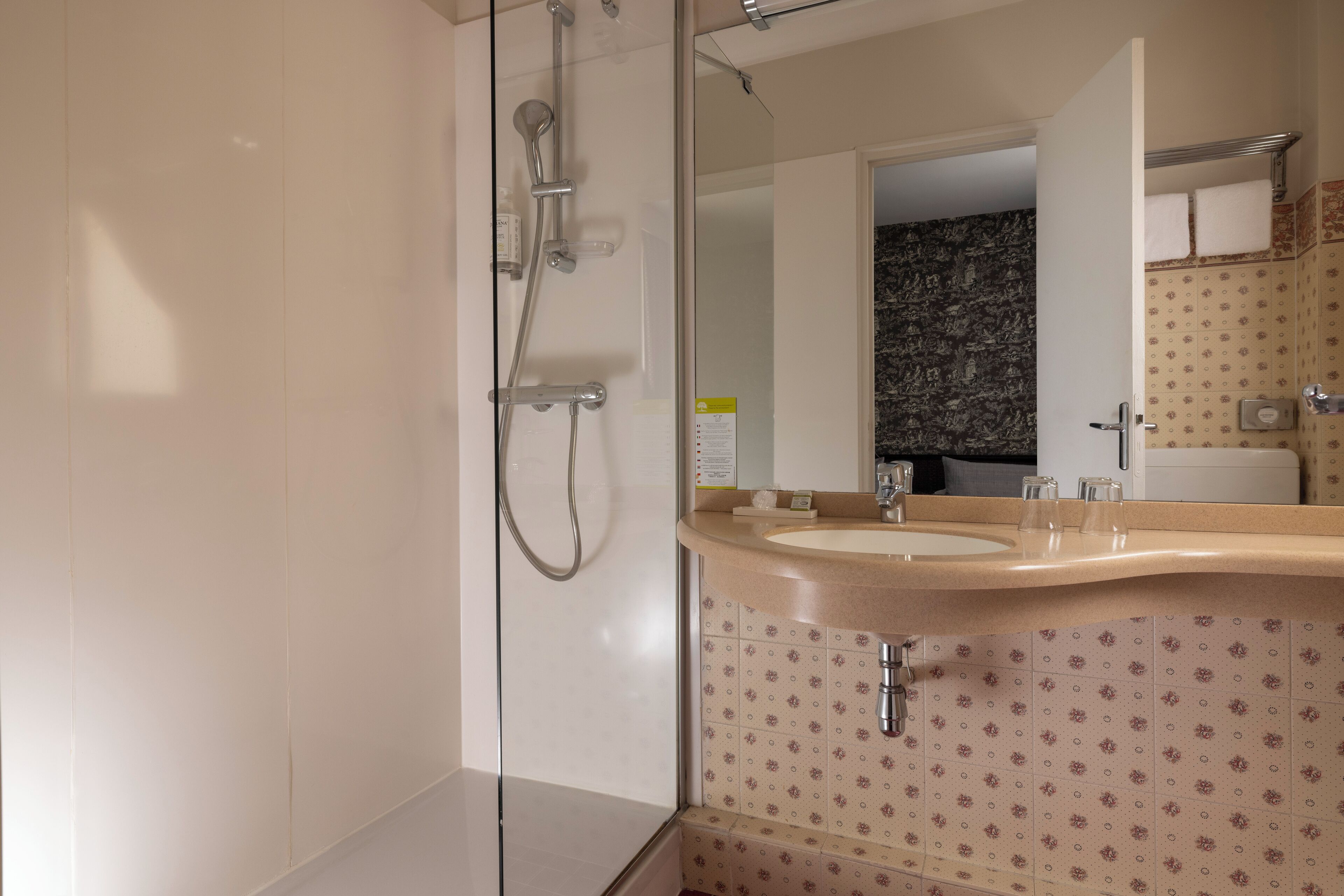 twin room, 2 single beds, courtyard view | bathroom | free toiletries, hair dryer, towels