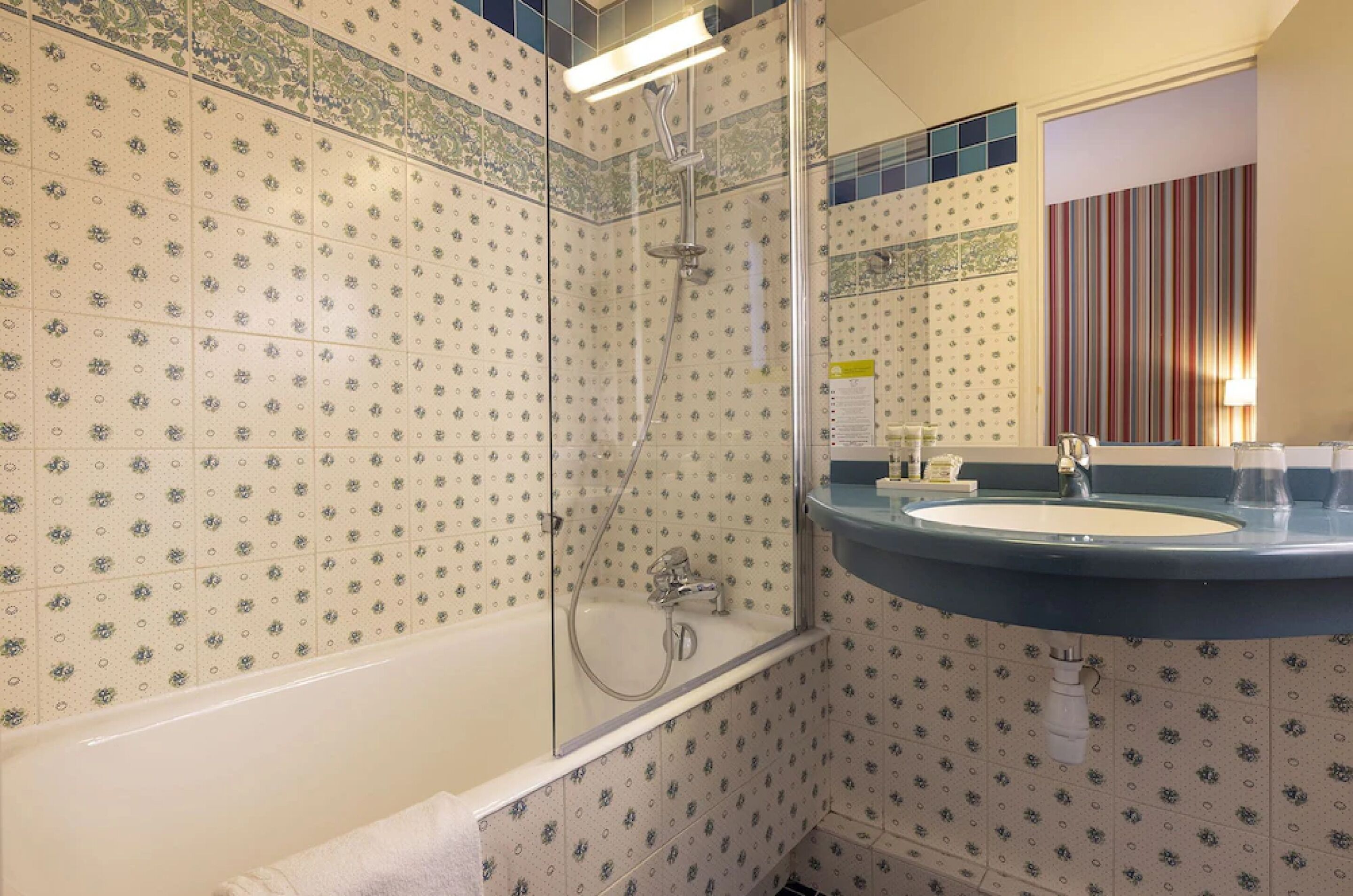 twin room, 2 single beds, courtyard view | bathroom | free toiletries, hair dryer, towels