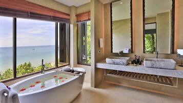 Bayfront Deluxe Room | Bathroom | Separate bathtub and shower, designer toiletries, hair dryer, bathrobes