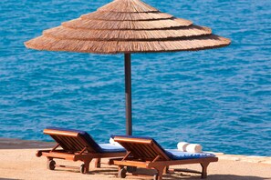 Private beach, sun loungers, beach umbrellas, beach towels