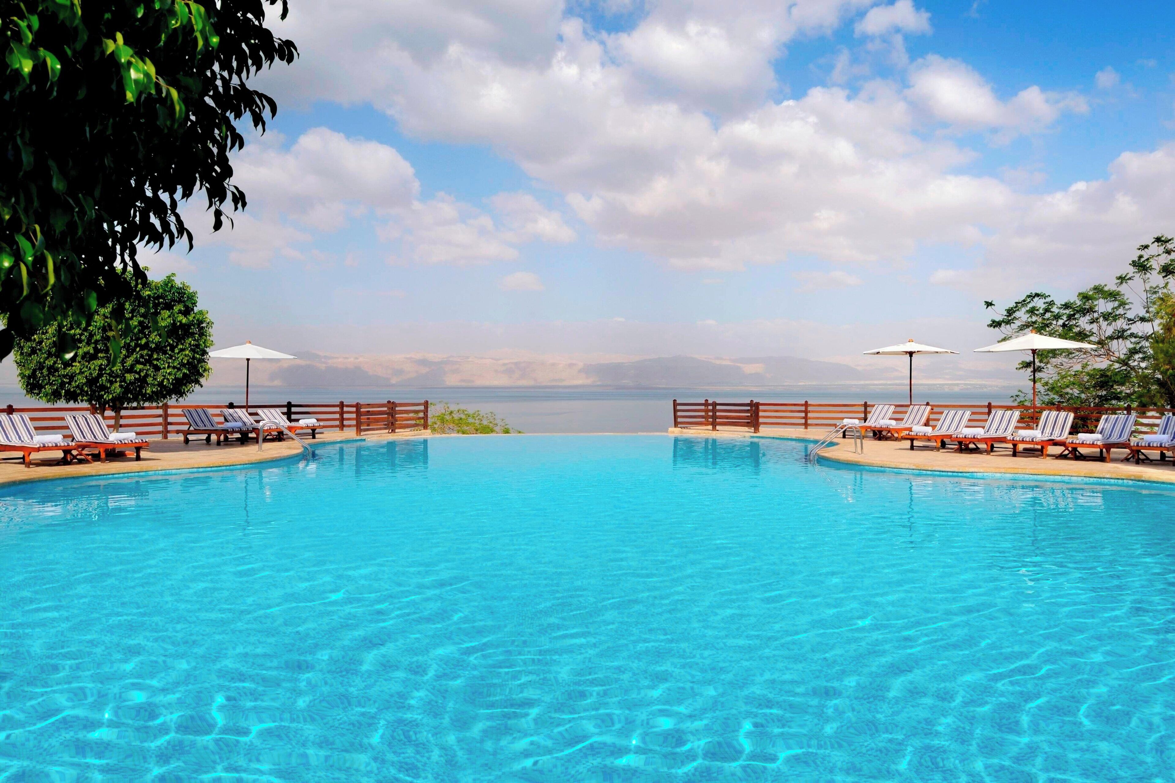 indoor pool, 3 outdoor pools, open 8:00 am to 8:00 pm, pool umbrellas