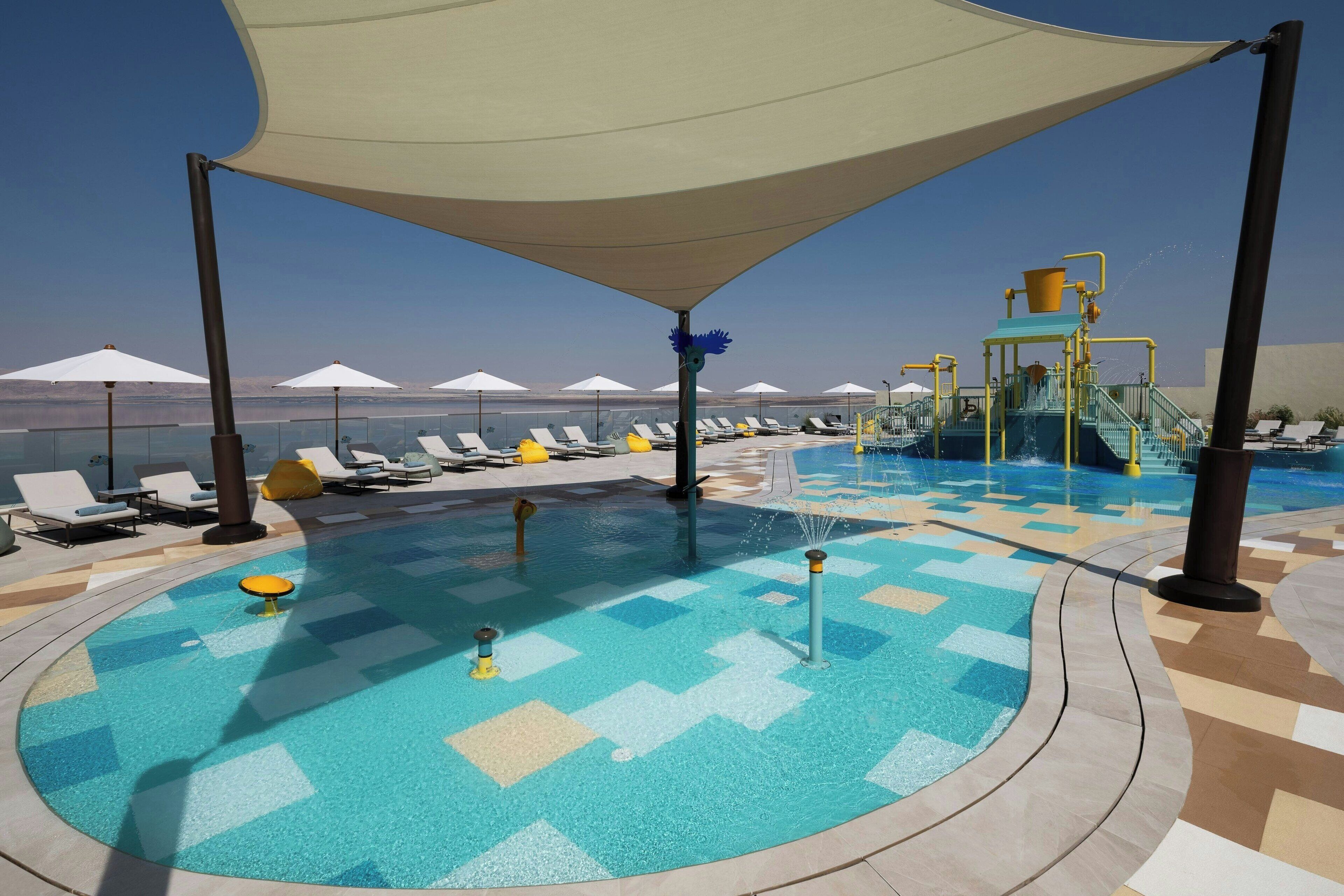 Indoor pool, 3 outdoor pools, open 8:00 AM to 8:00 PM, pool umbrellas