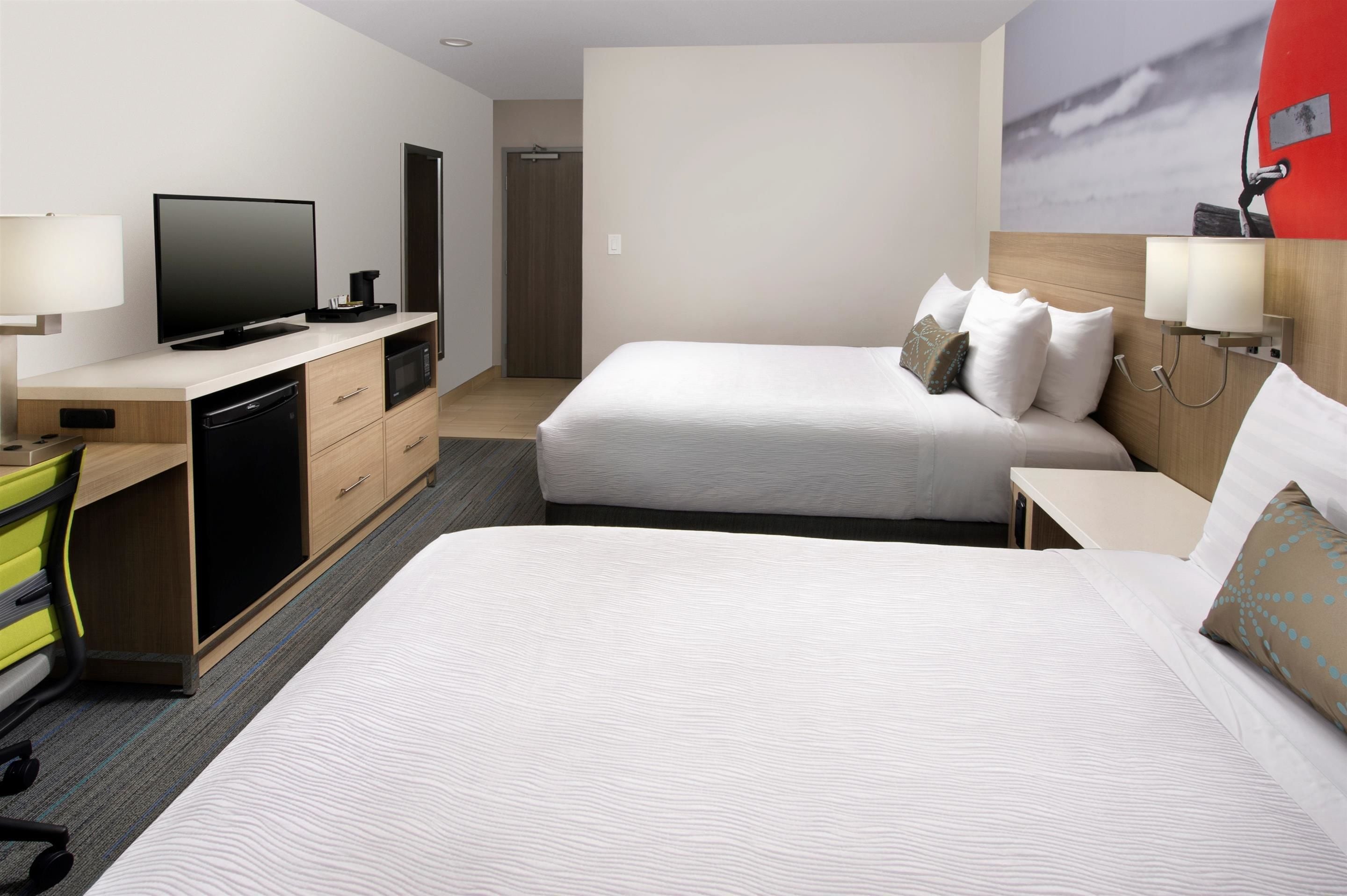 standard room, 2 queen beds, non smoking, refrigerator & microwave | down duvets, in-room safe, desk, laptop workspace