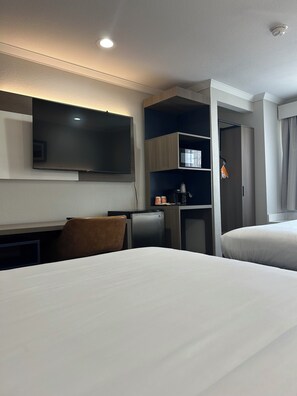 Standard Room, 2 Queen Beds, Non Smoking | In-room safe, desk, blackout drapes, iron/ironing board